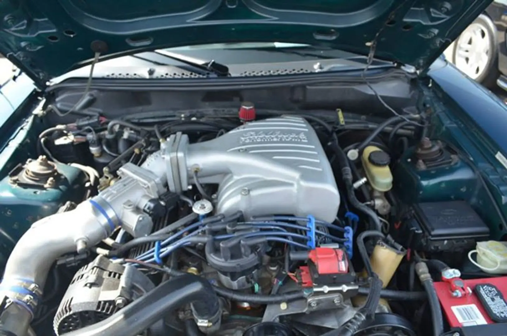 Engine components and wires visible