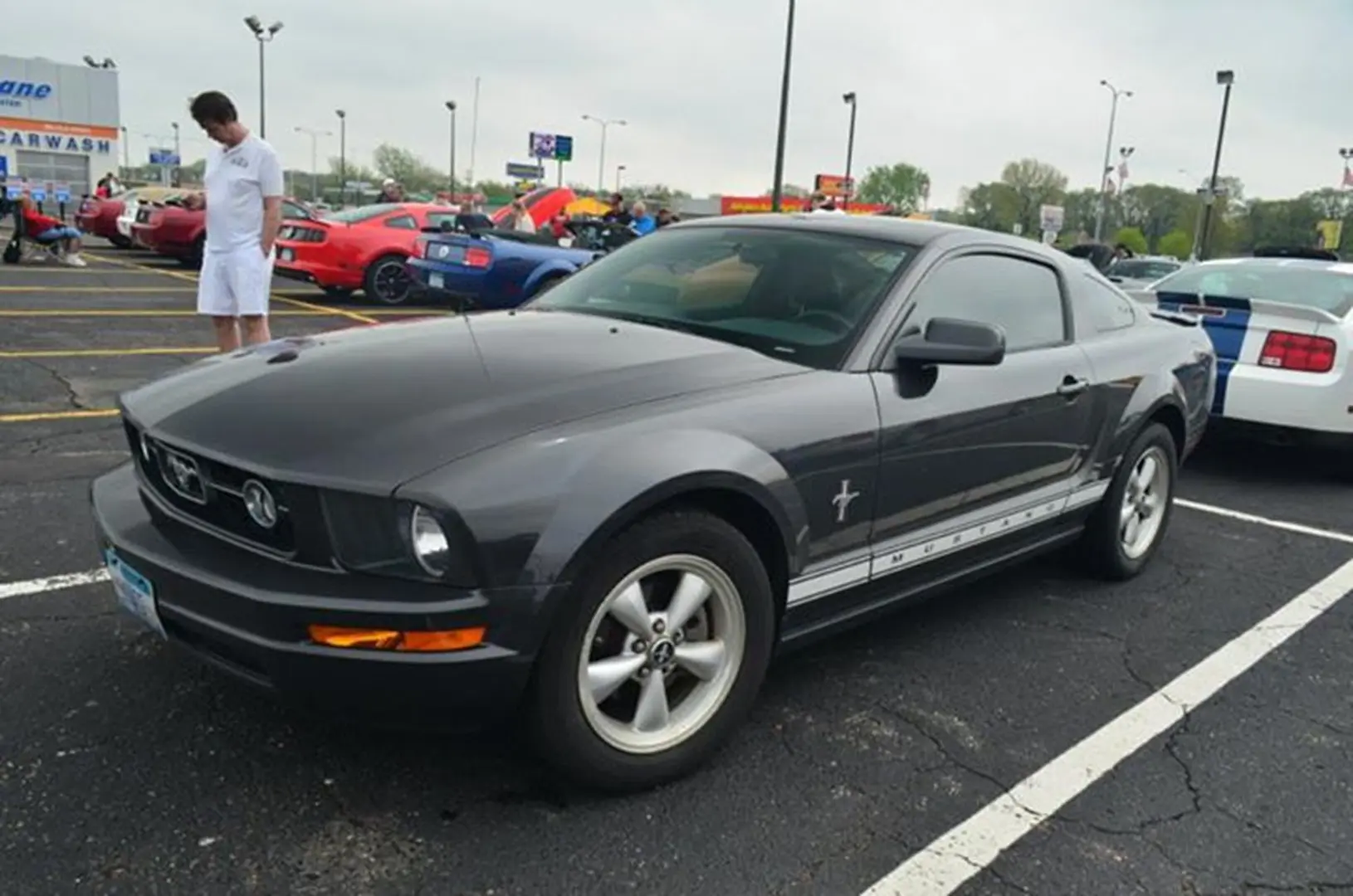 Gray Mustang parked outdoors