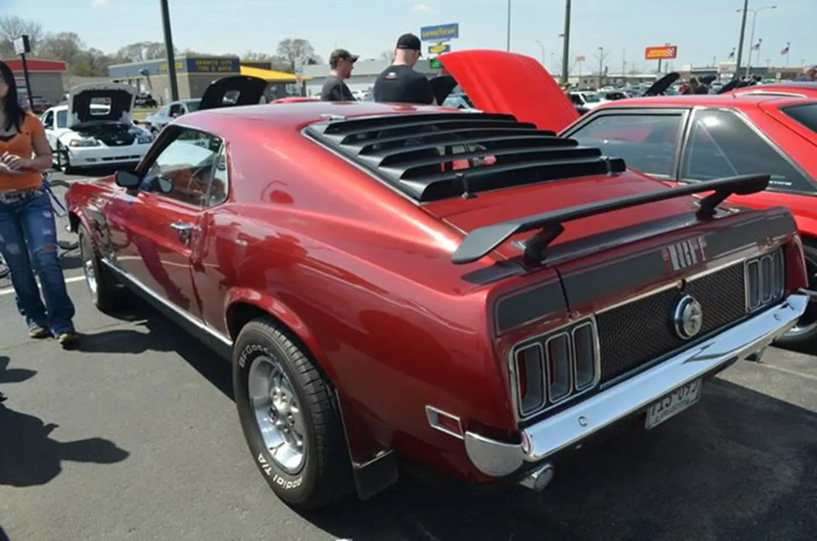 Vintage red car with rear spoiler