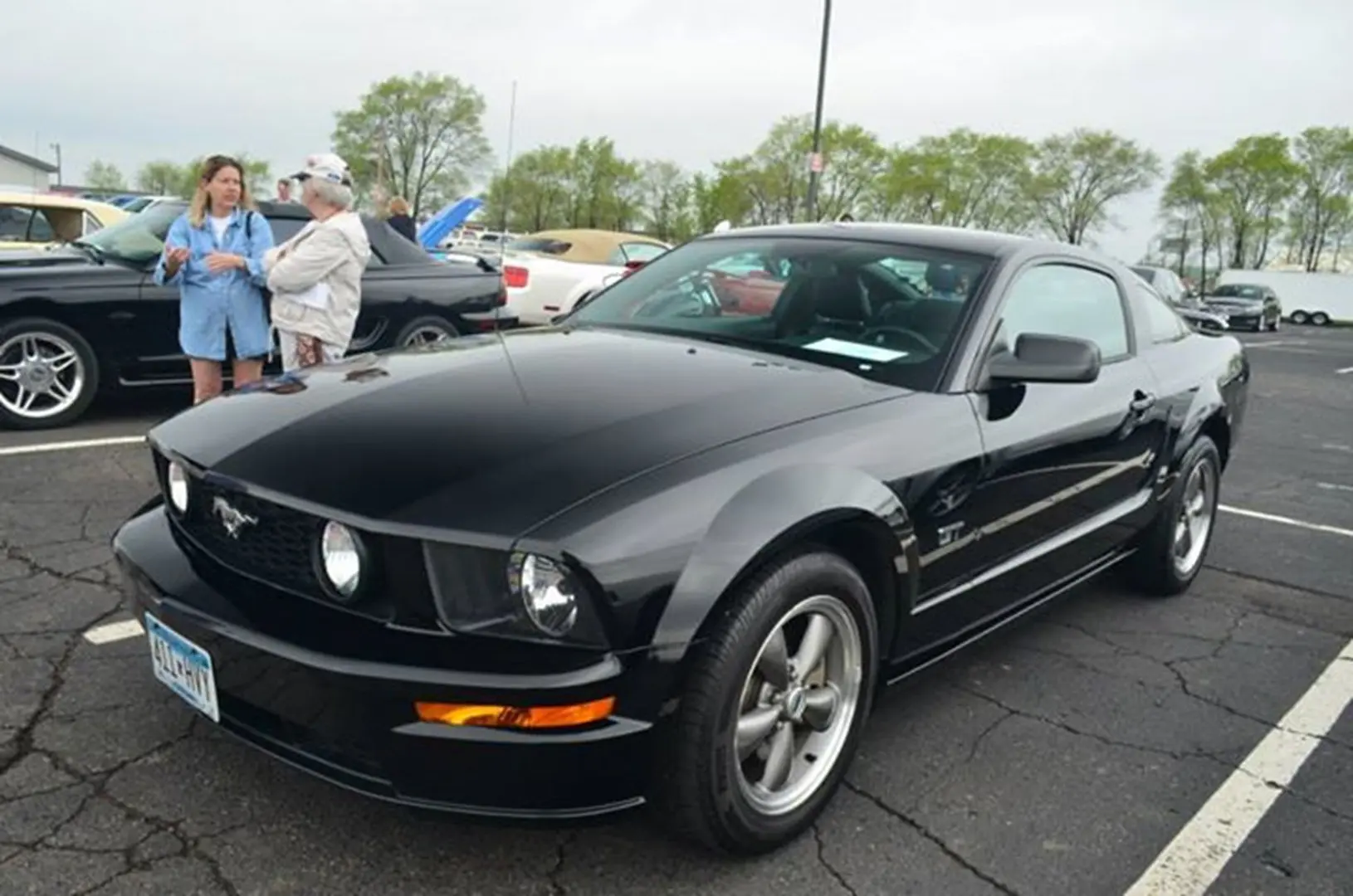Shiny black sports car at car show