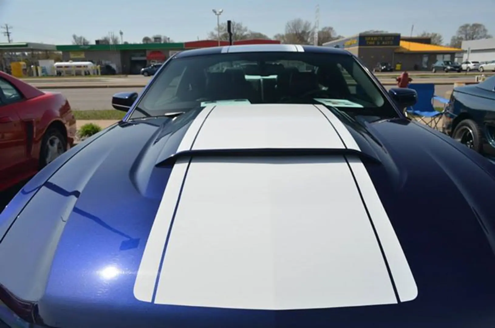 Blue sports car parked outdoors