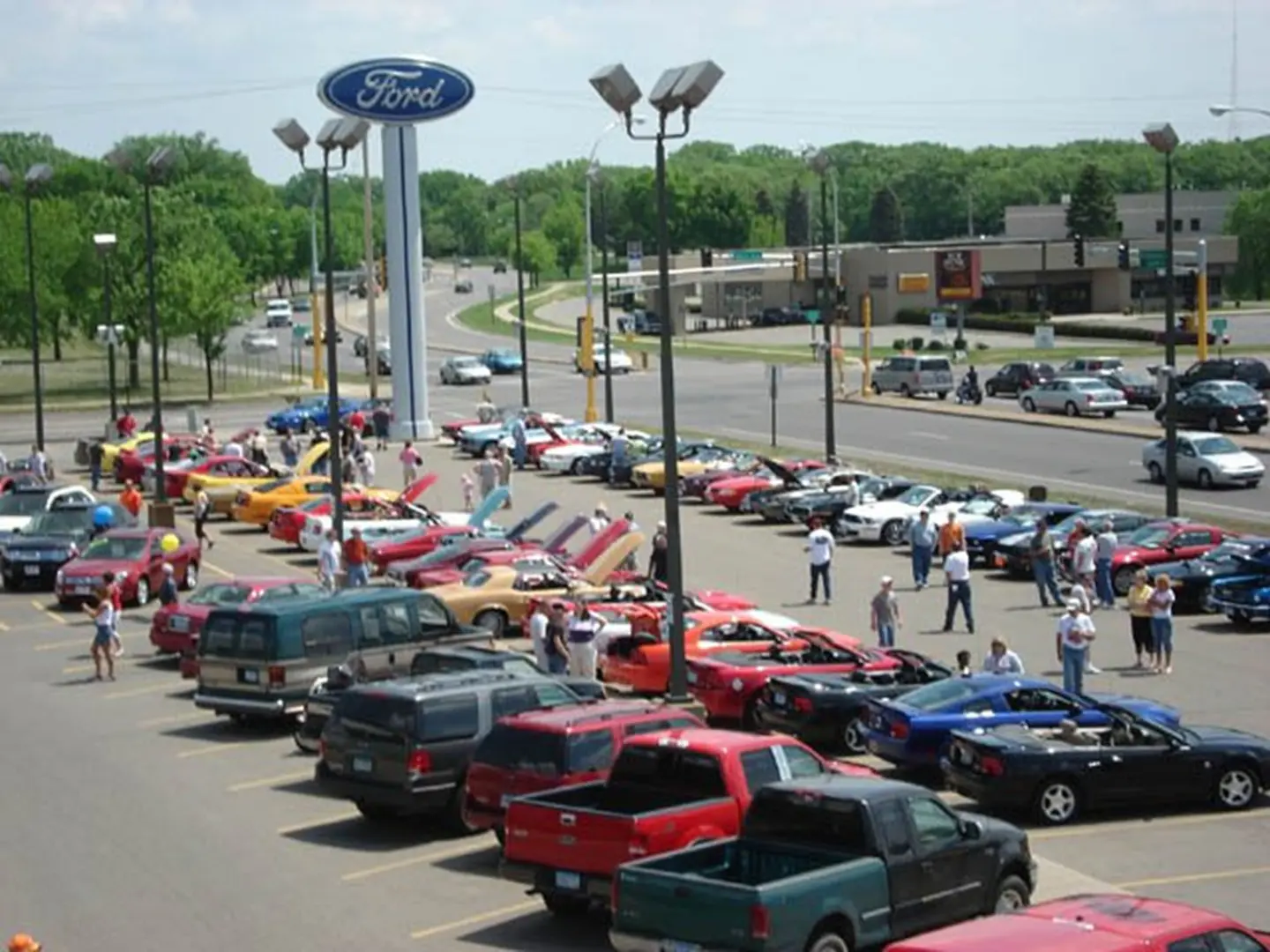Colorful cars parked in dealership lot