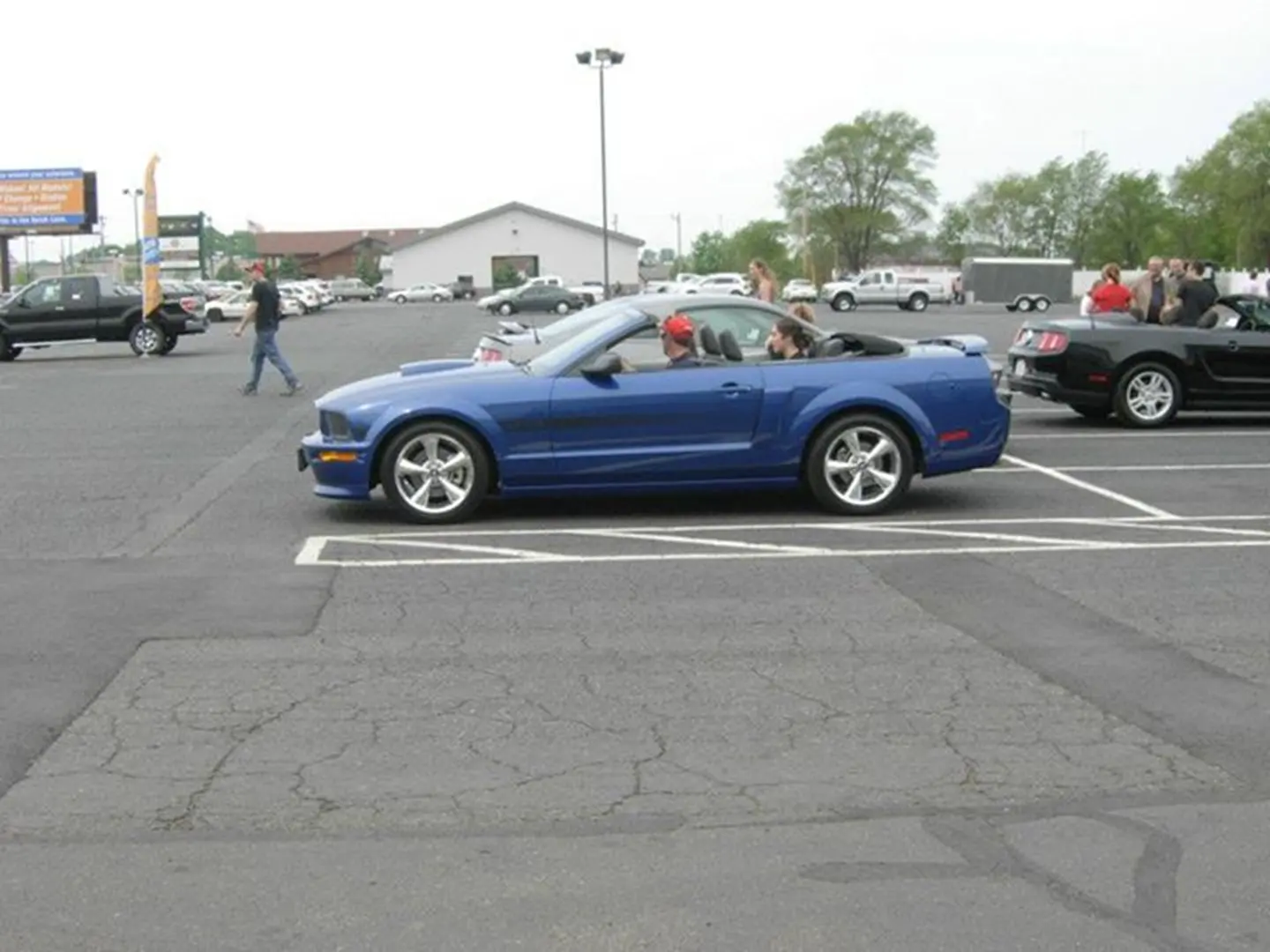 Blue sports car with open roof