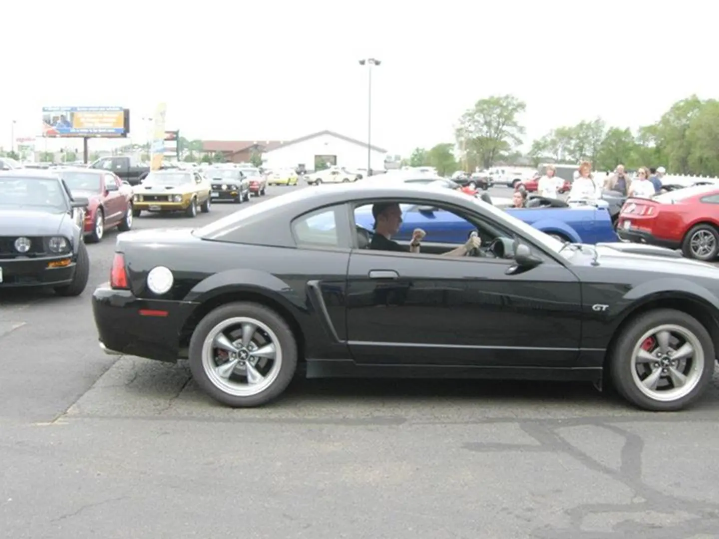 Black sports car at a car meet