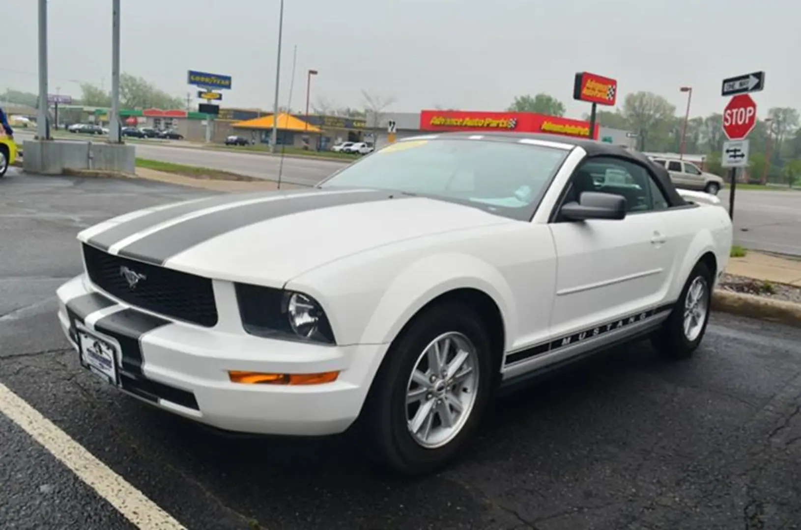 Classic white convertible with racing stripes