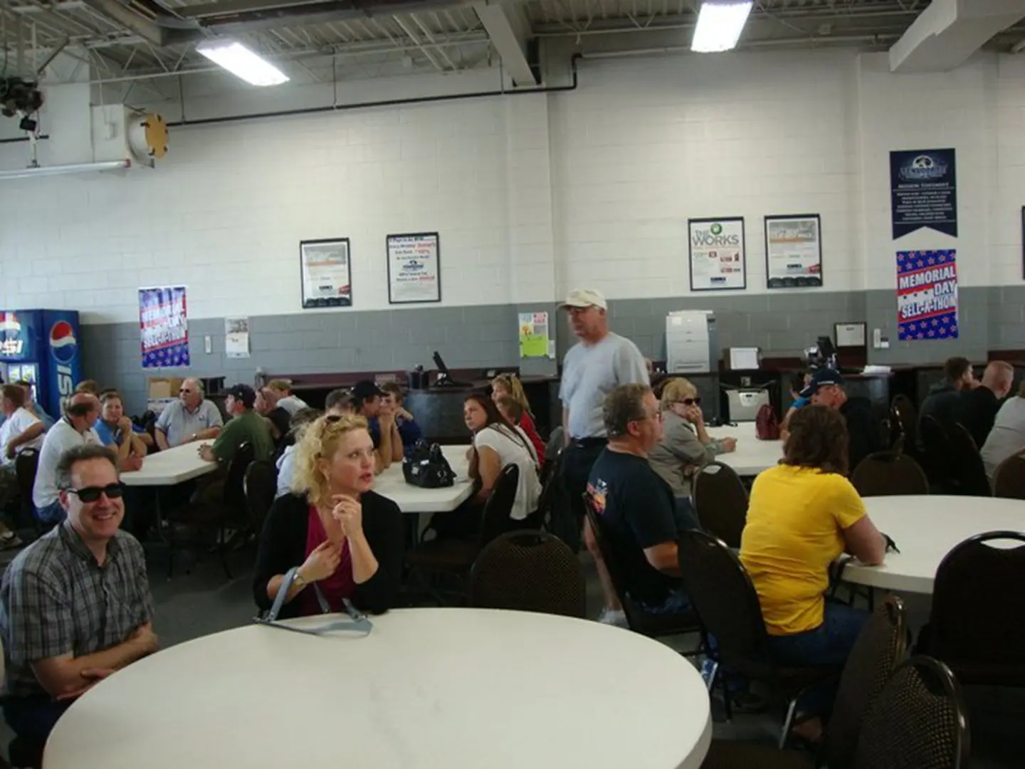 Indoor gathering with tables and chairs