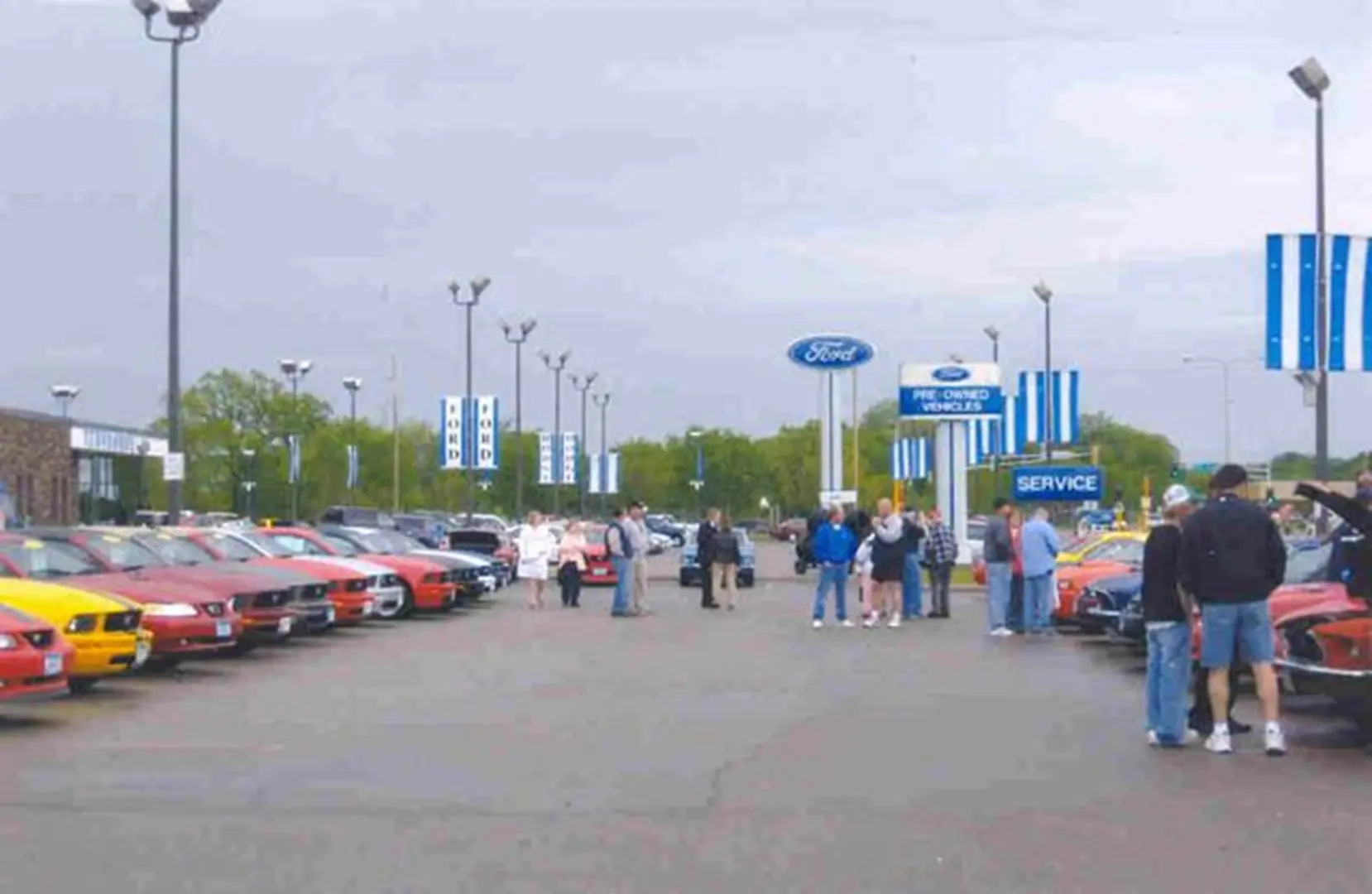 Car dealership lot with parked vehicles