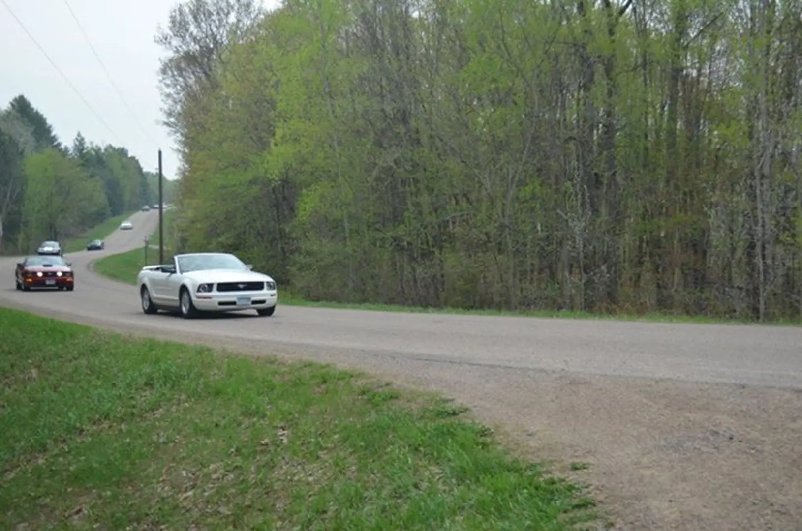 Cars driving on a rural road