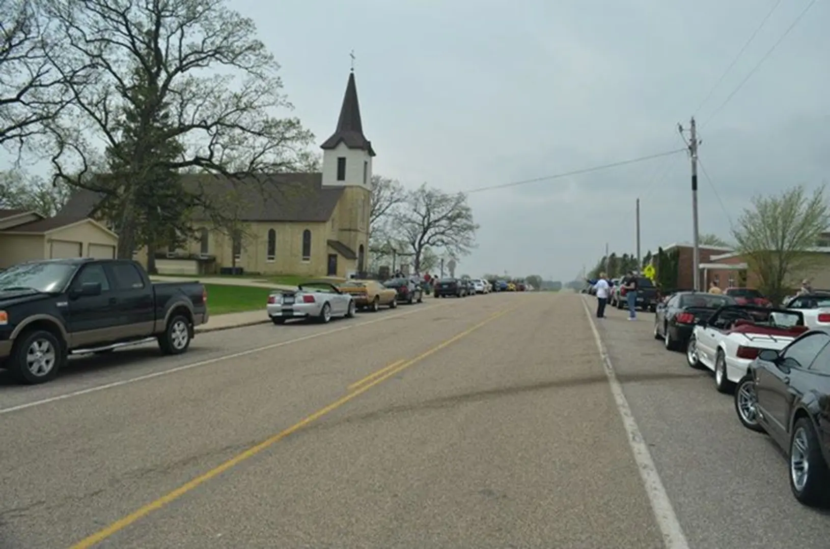Church with cars lined up on street