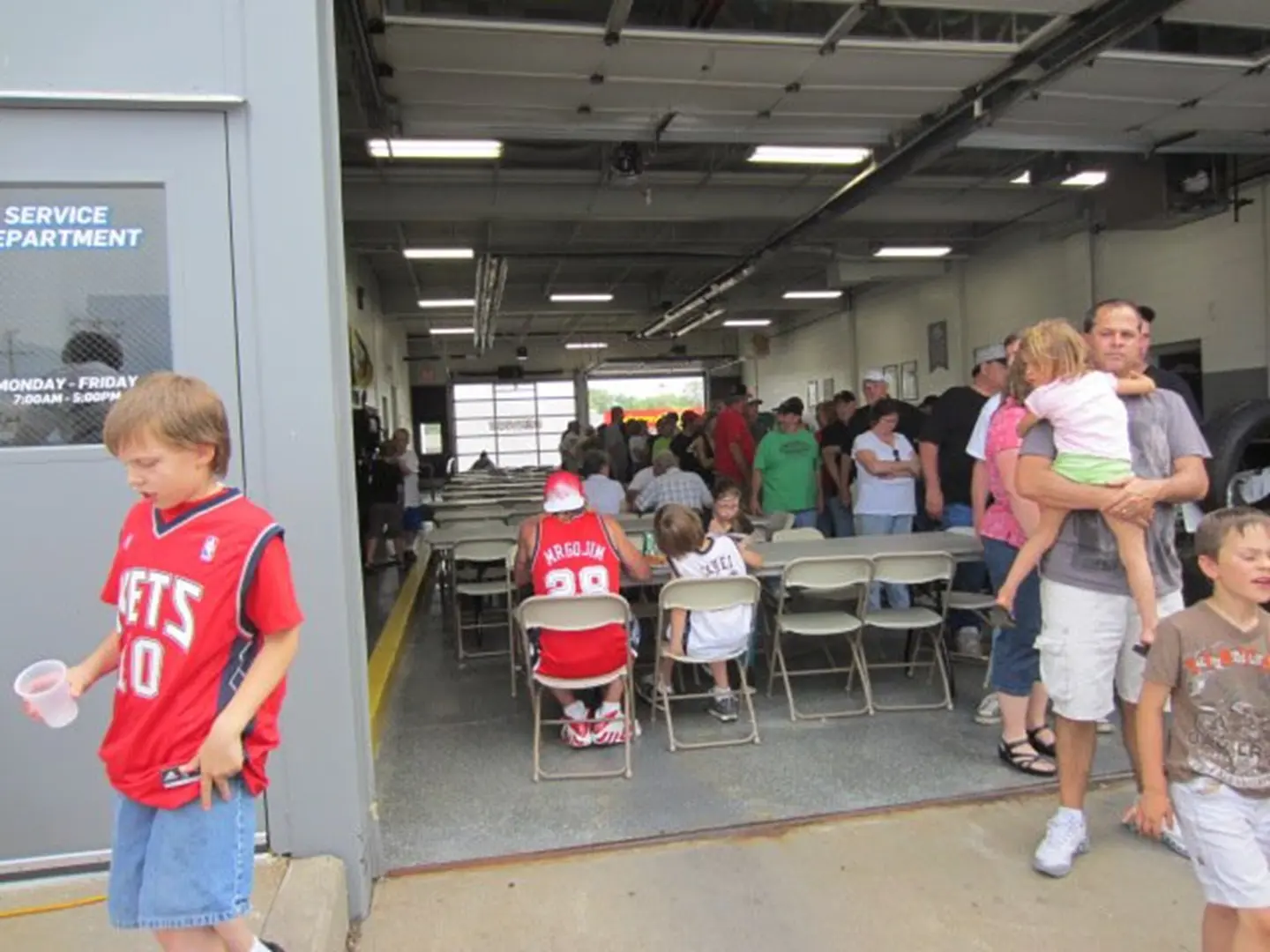 Indoor community gathering with families