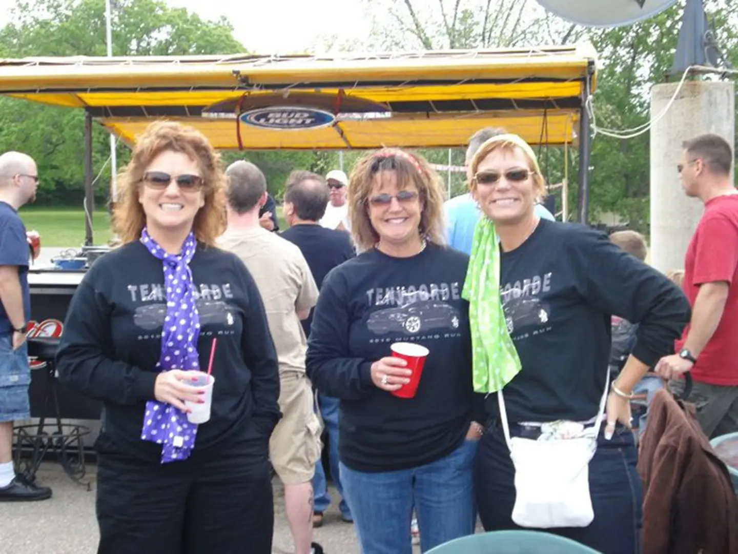 Group of women with drinks and smiles