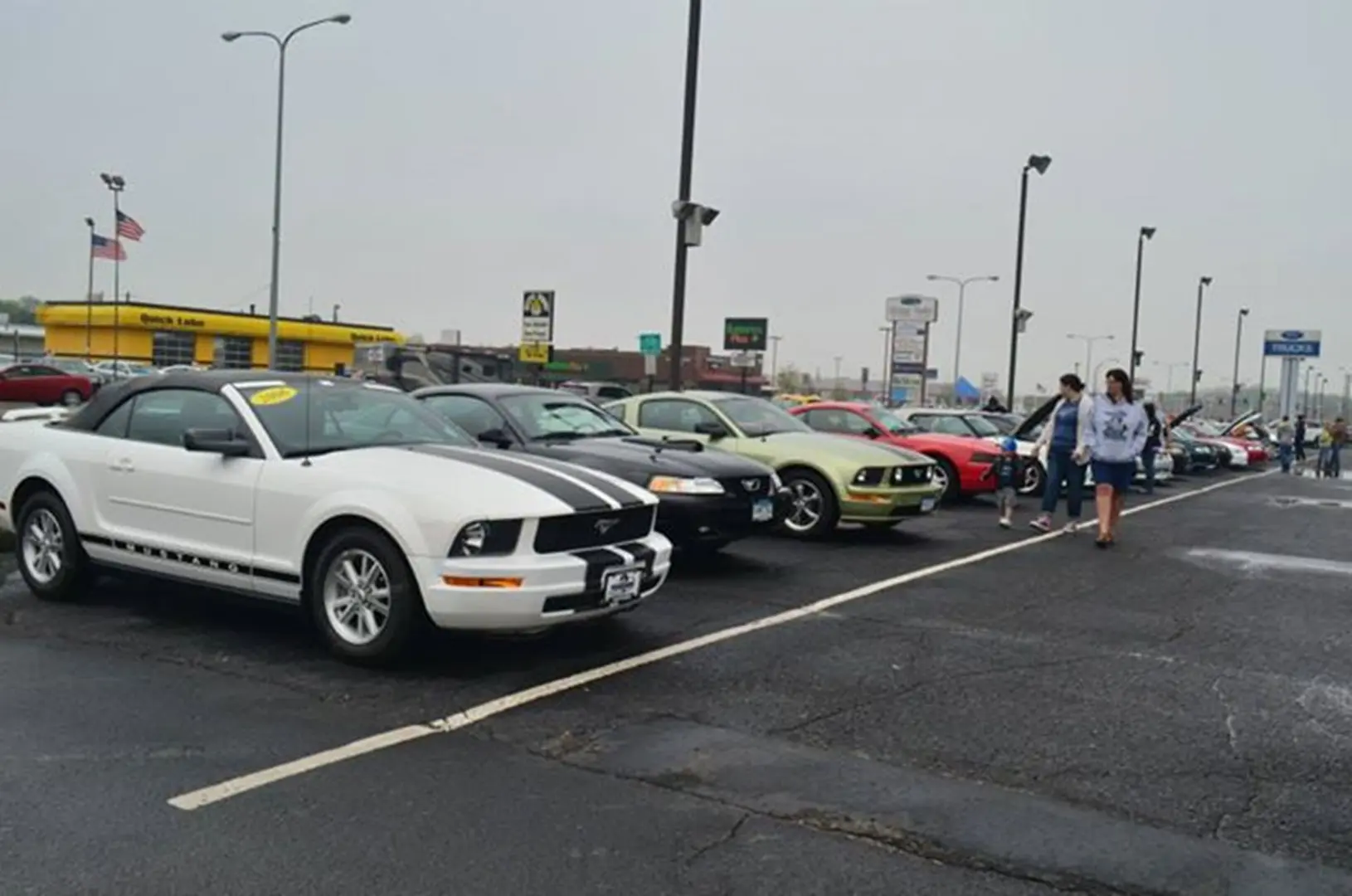 Car dealership lot with various vehicles