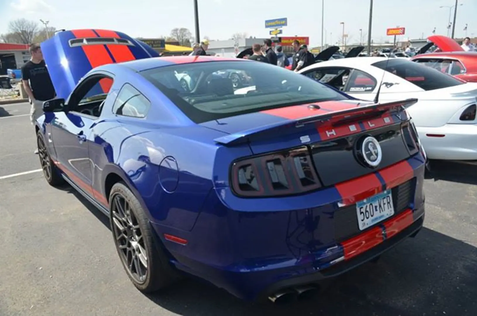 Blue sports car with red stripes