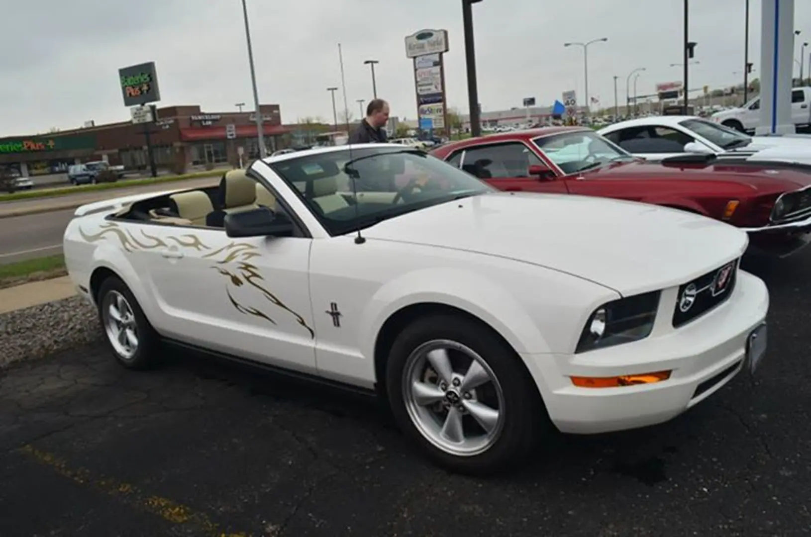 White convertible car with flame decals
