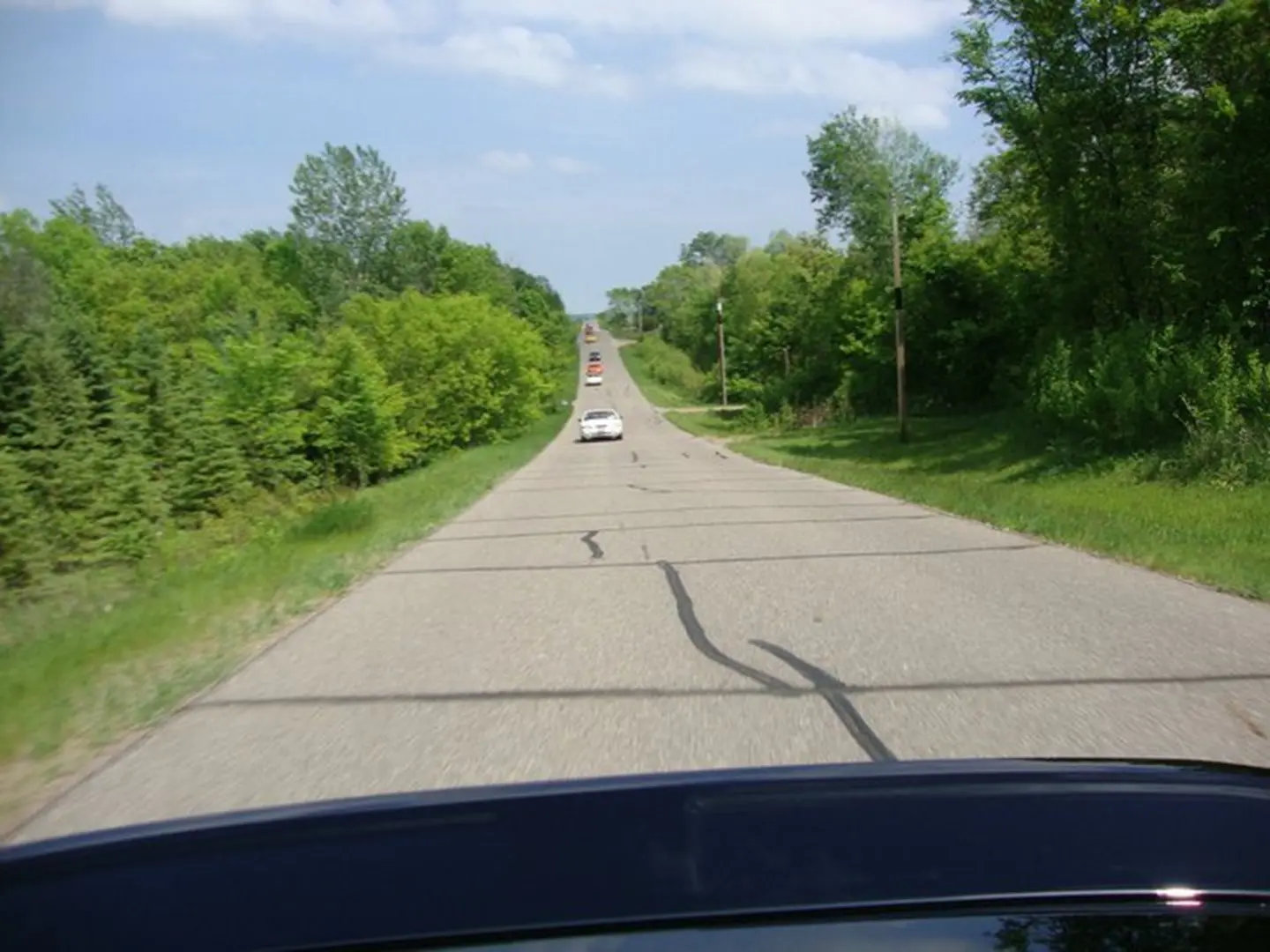 Cars driving on a rural road