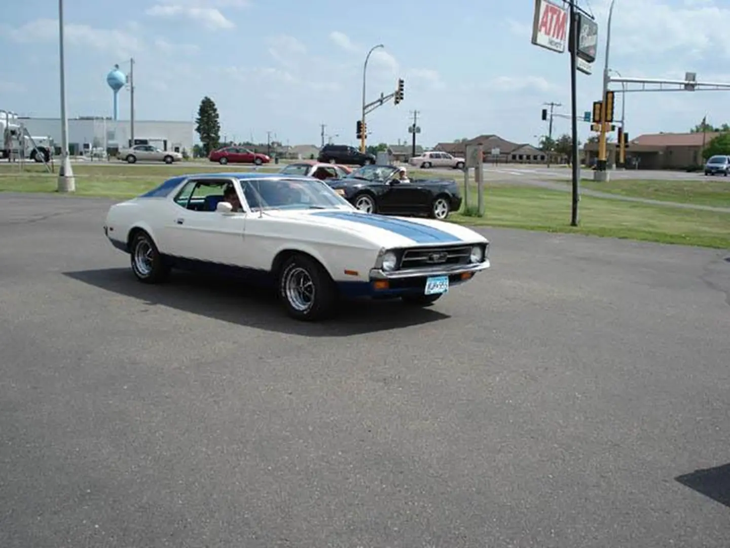 Vintage white car in parking lot