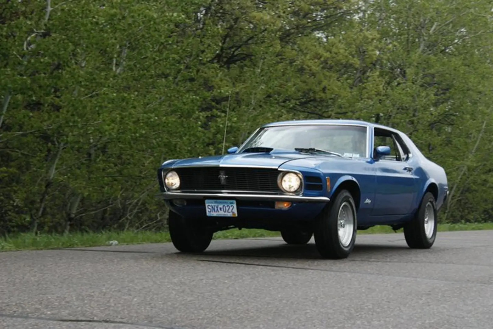 Retro vehicle on countryside drive
