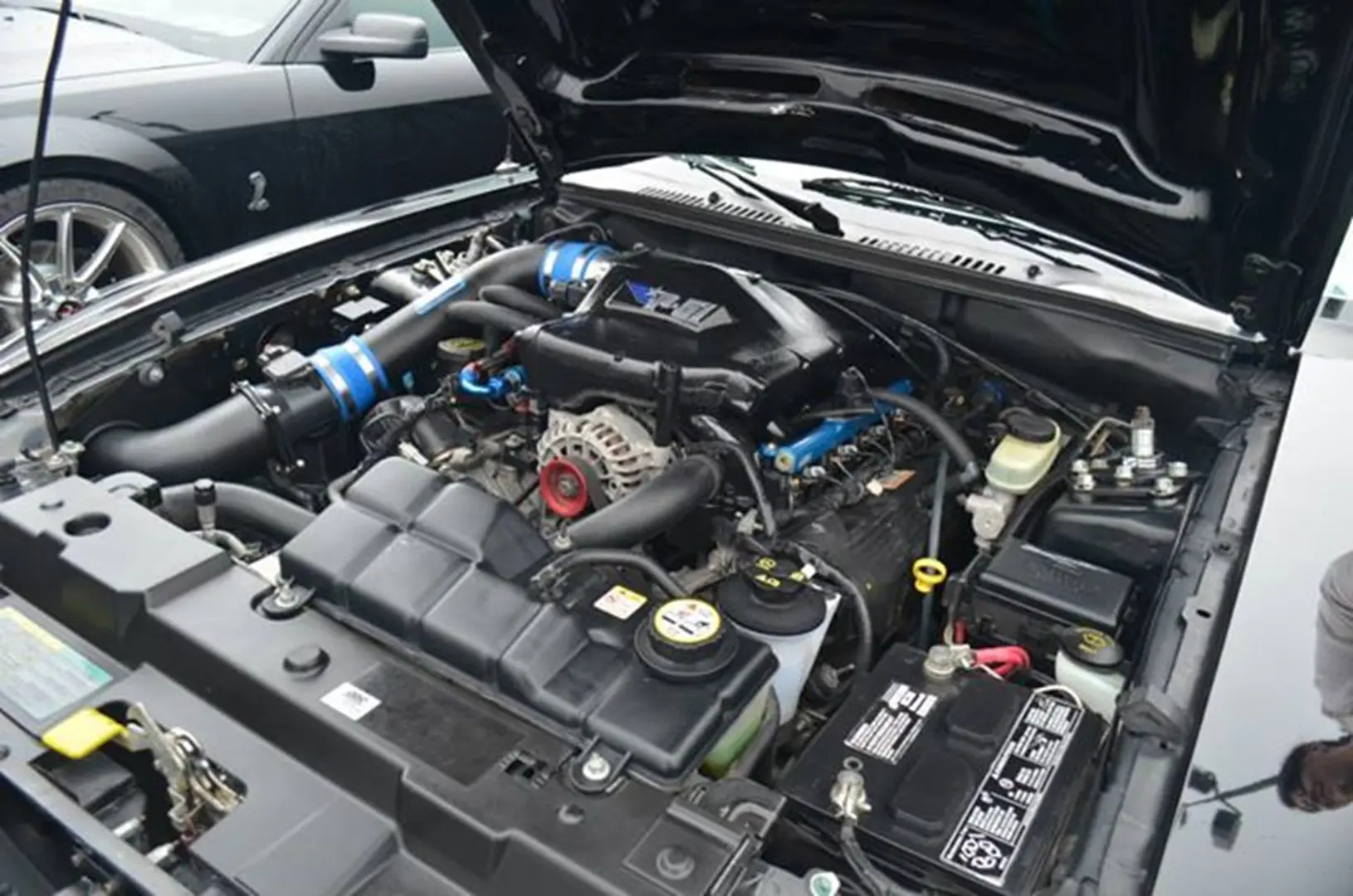 Car engine with open hood