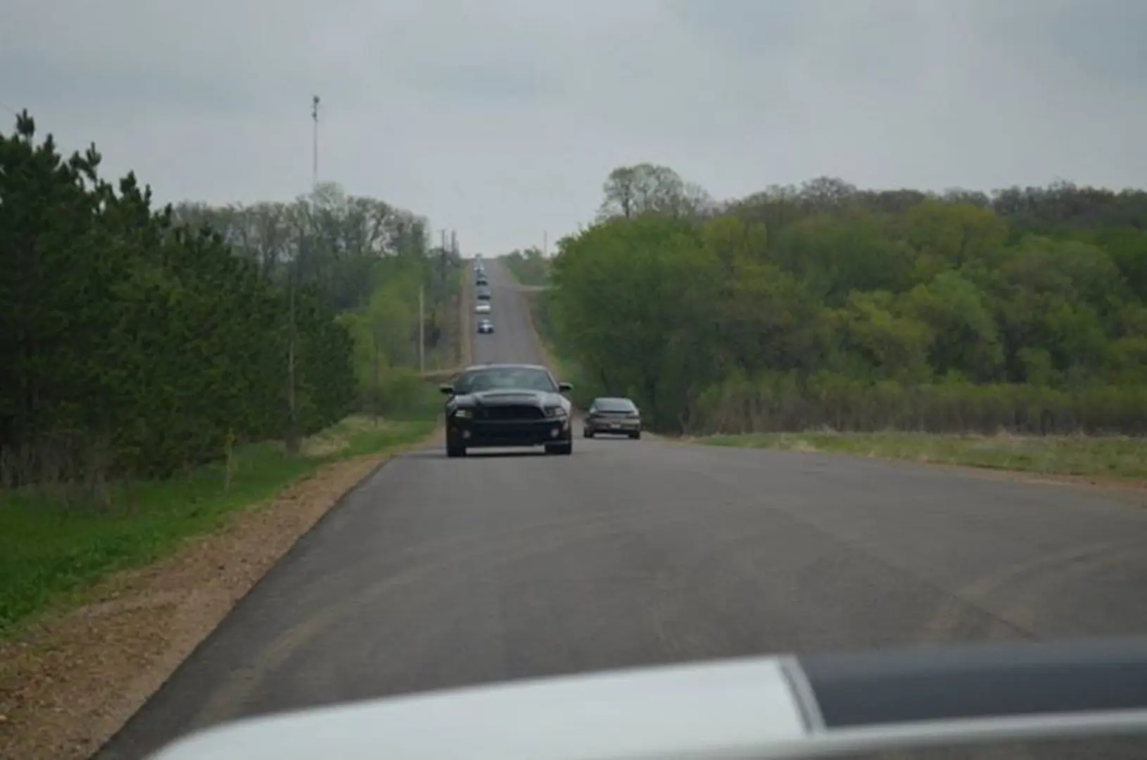 Cars driving on a rural road