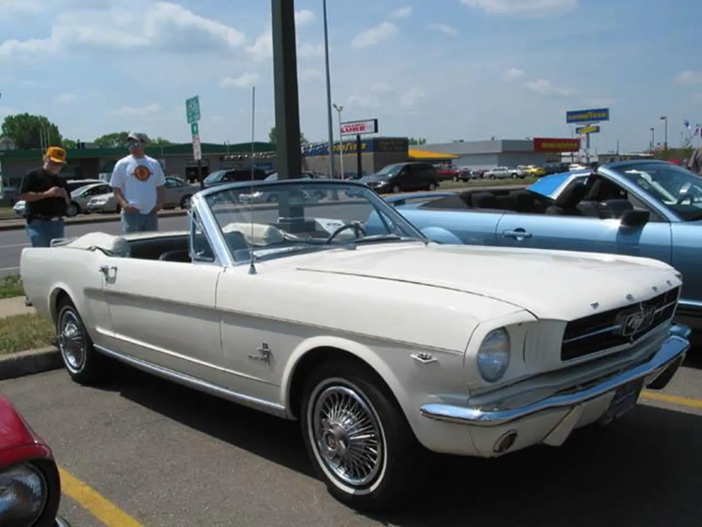 Classic white convertible car on display