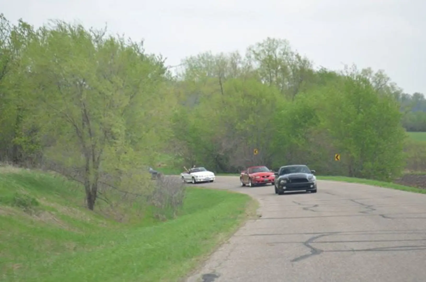 Cars driving on a rural road