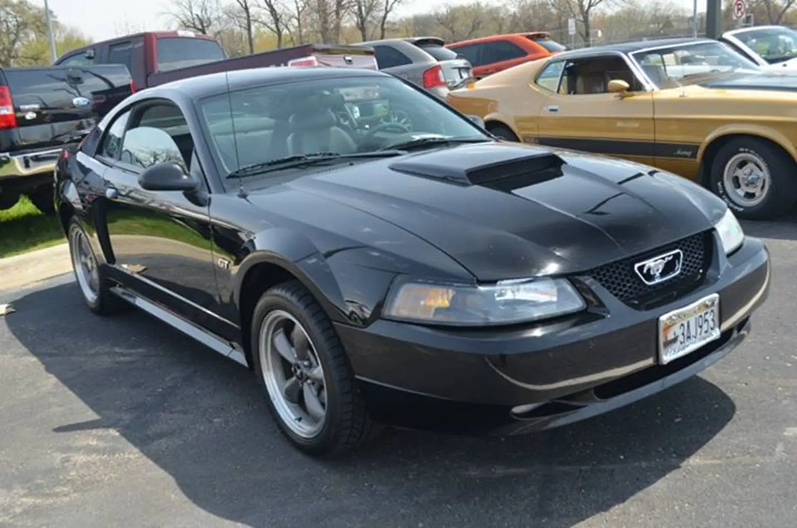 Sleek black car with scoop hood