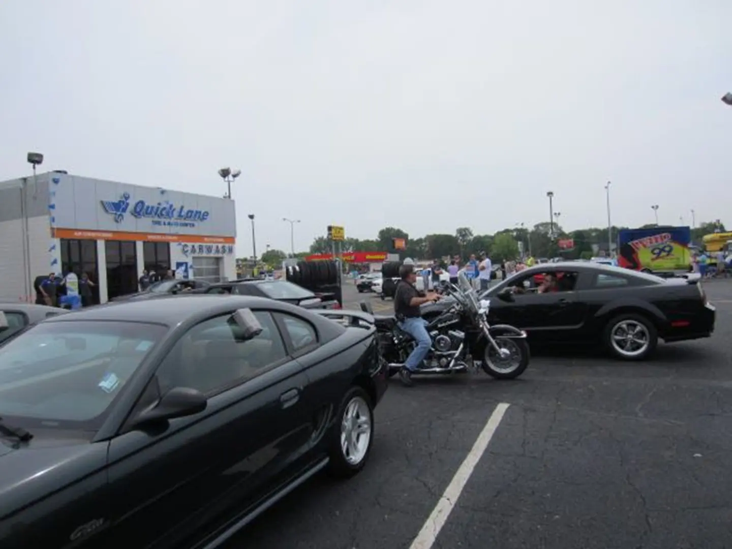 People gathering near auto service center