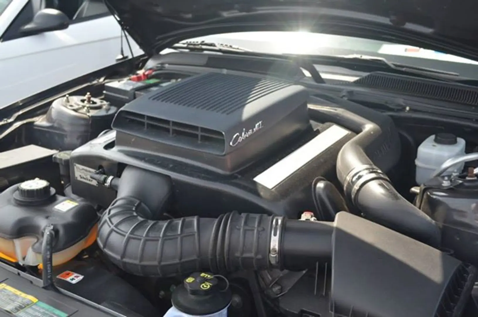 Engine bay showing various parts