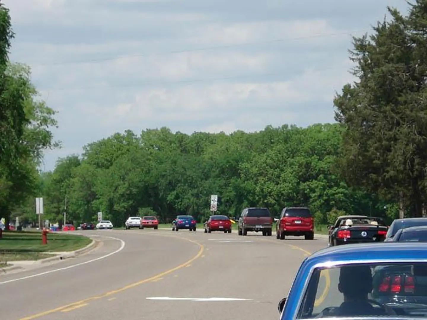 Traffic on a sunny day road