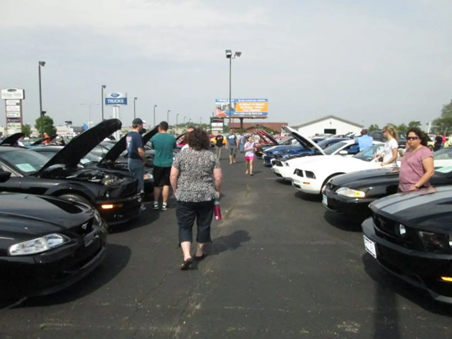 People walking at car exhibition