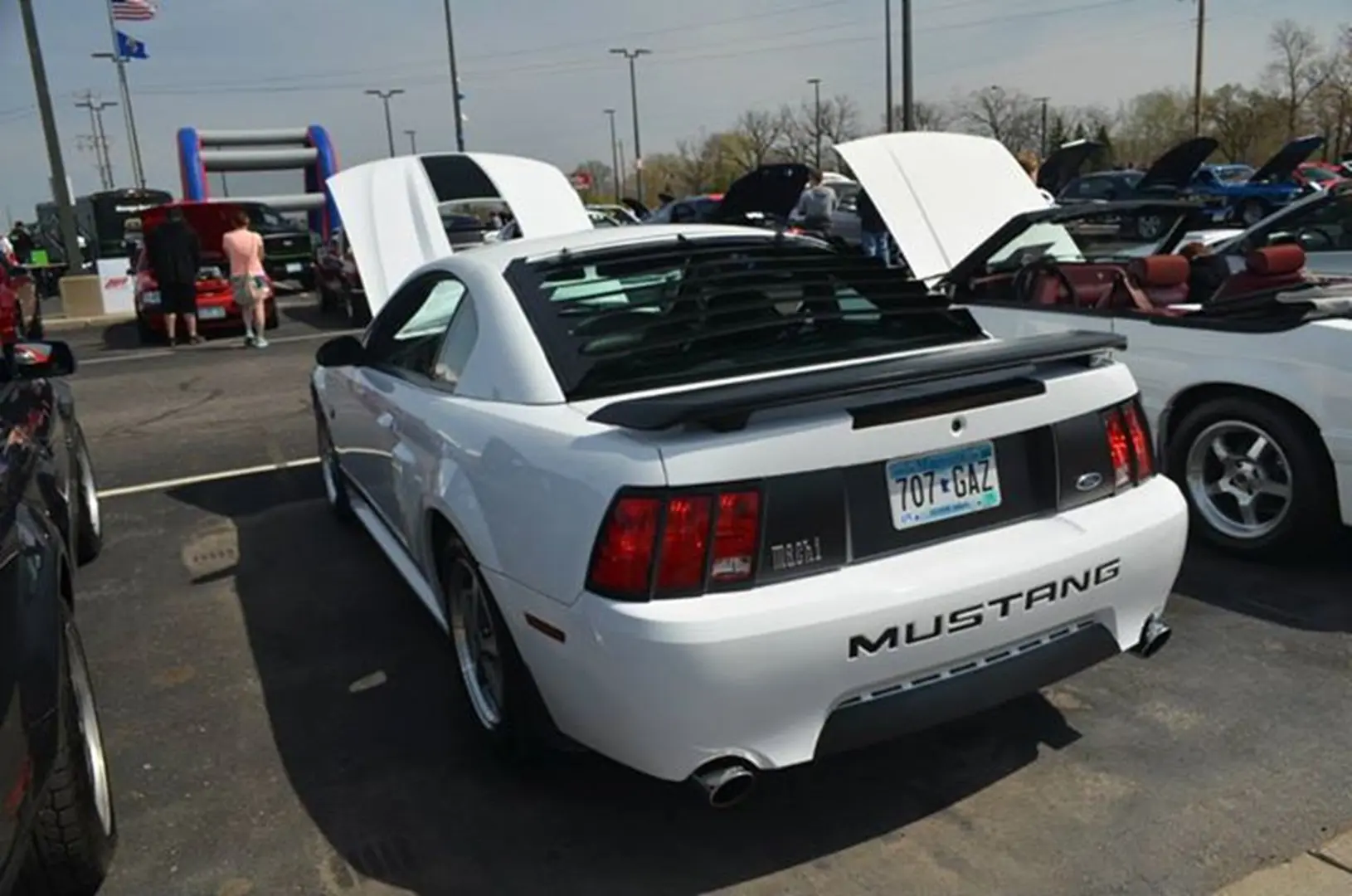 Rear view of a white Mustang