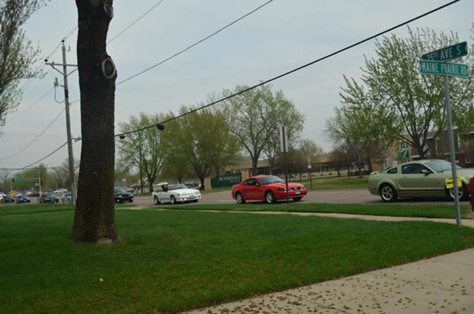 Street intersection with parked cars