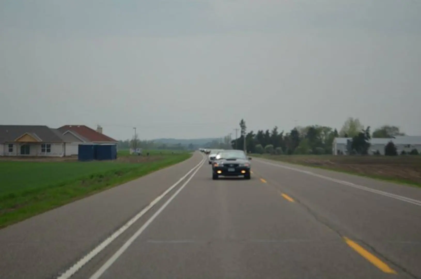 Vehicle on open countryside highway