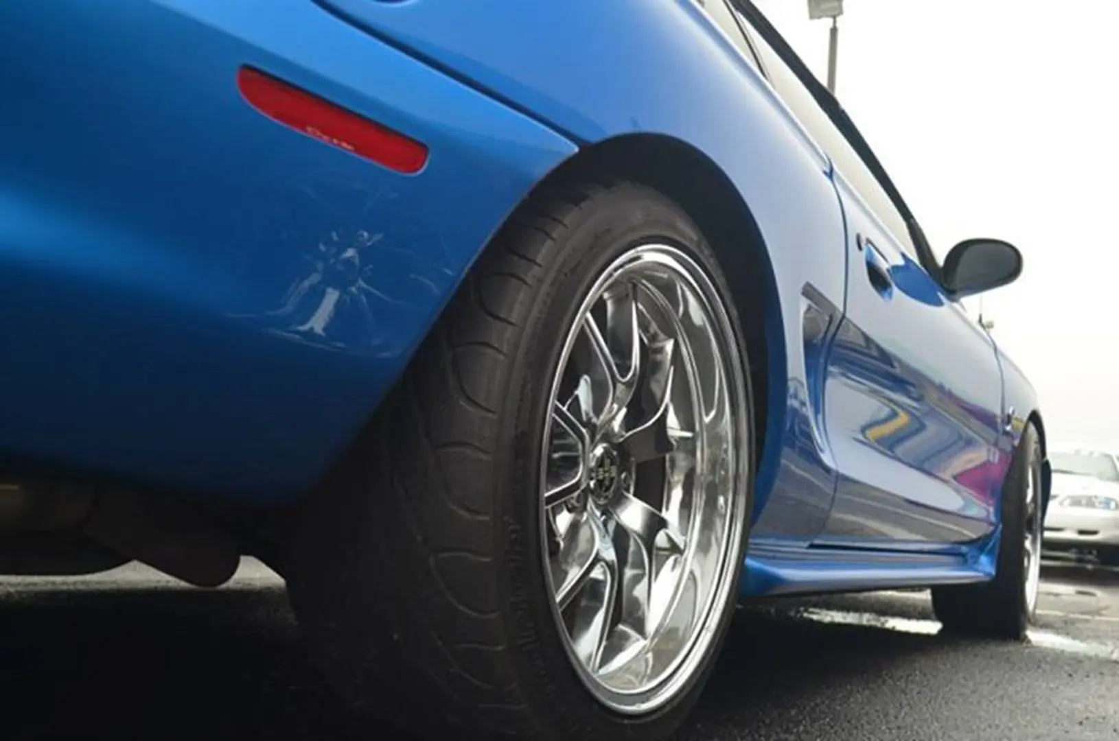 Low angle view of blue car