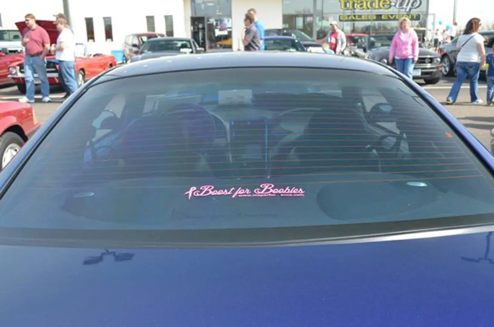 Blue car at outdoor car show