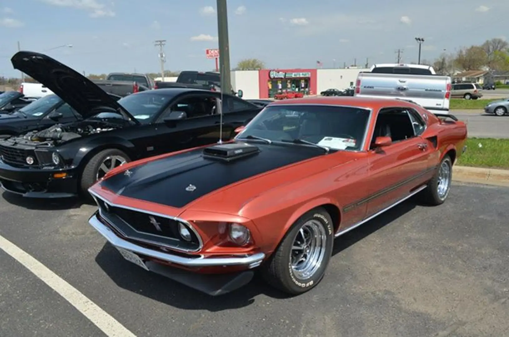 Vintage car with black hood scoop