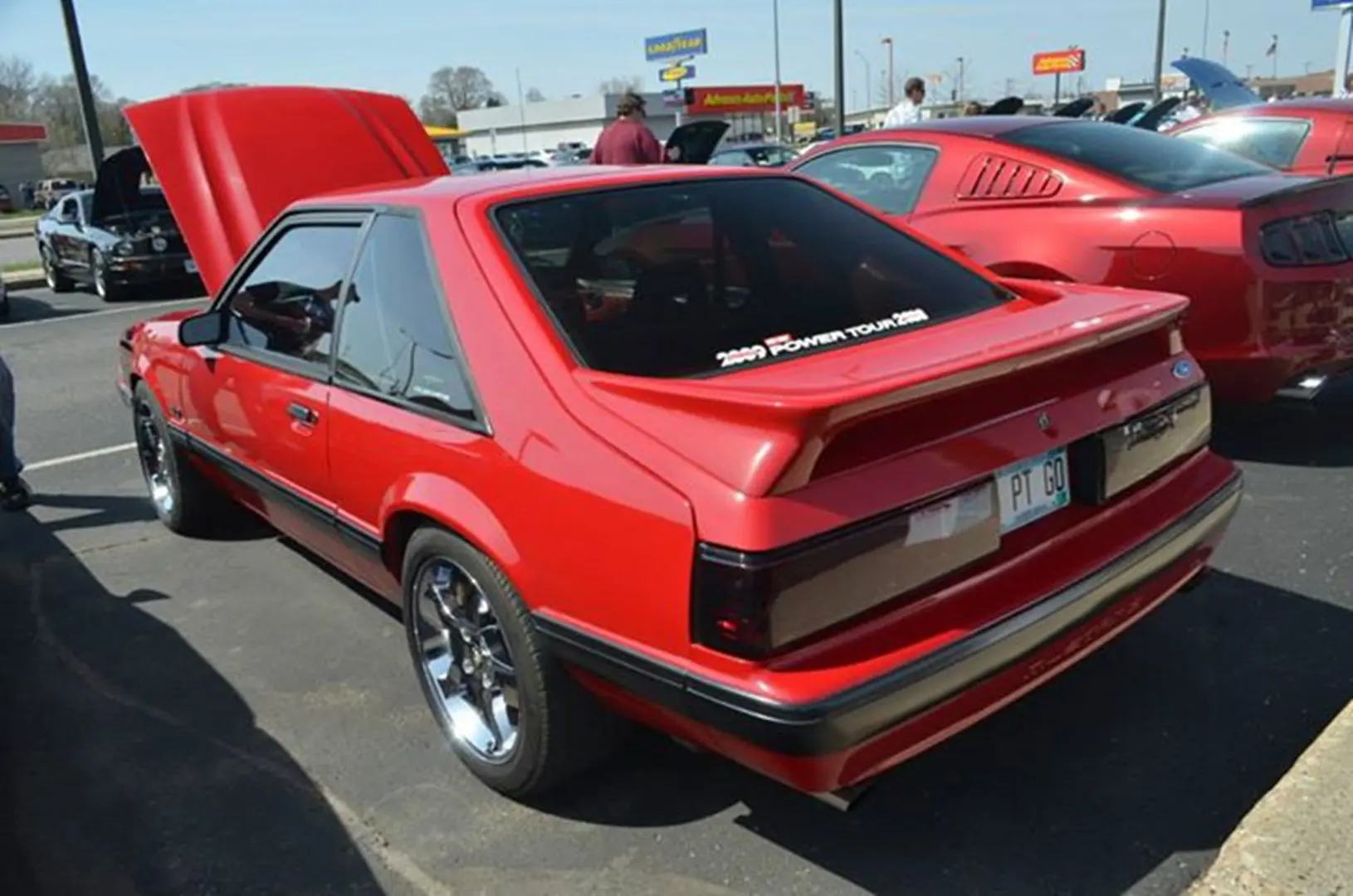 Shiny red vehicle at car show