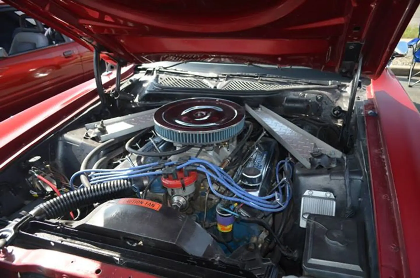 Classic car engine with blue wires