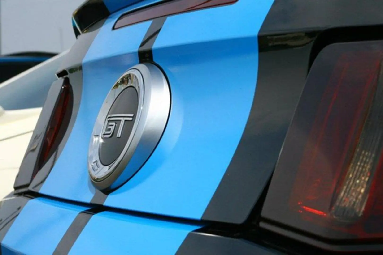 Rear view of a GT-striped vehicle