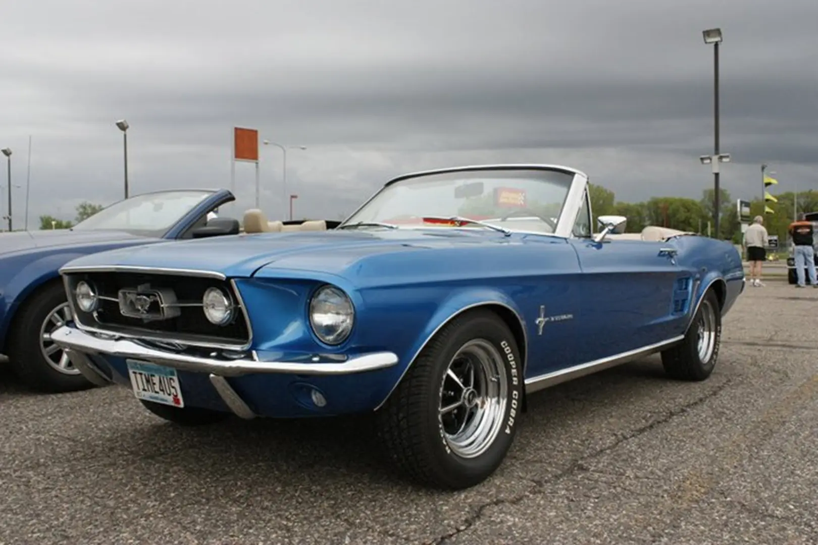 Classic blue convertible car on display