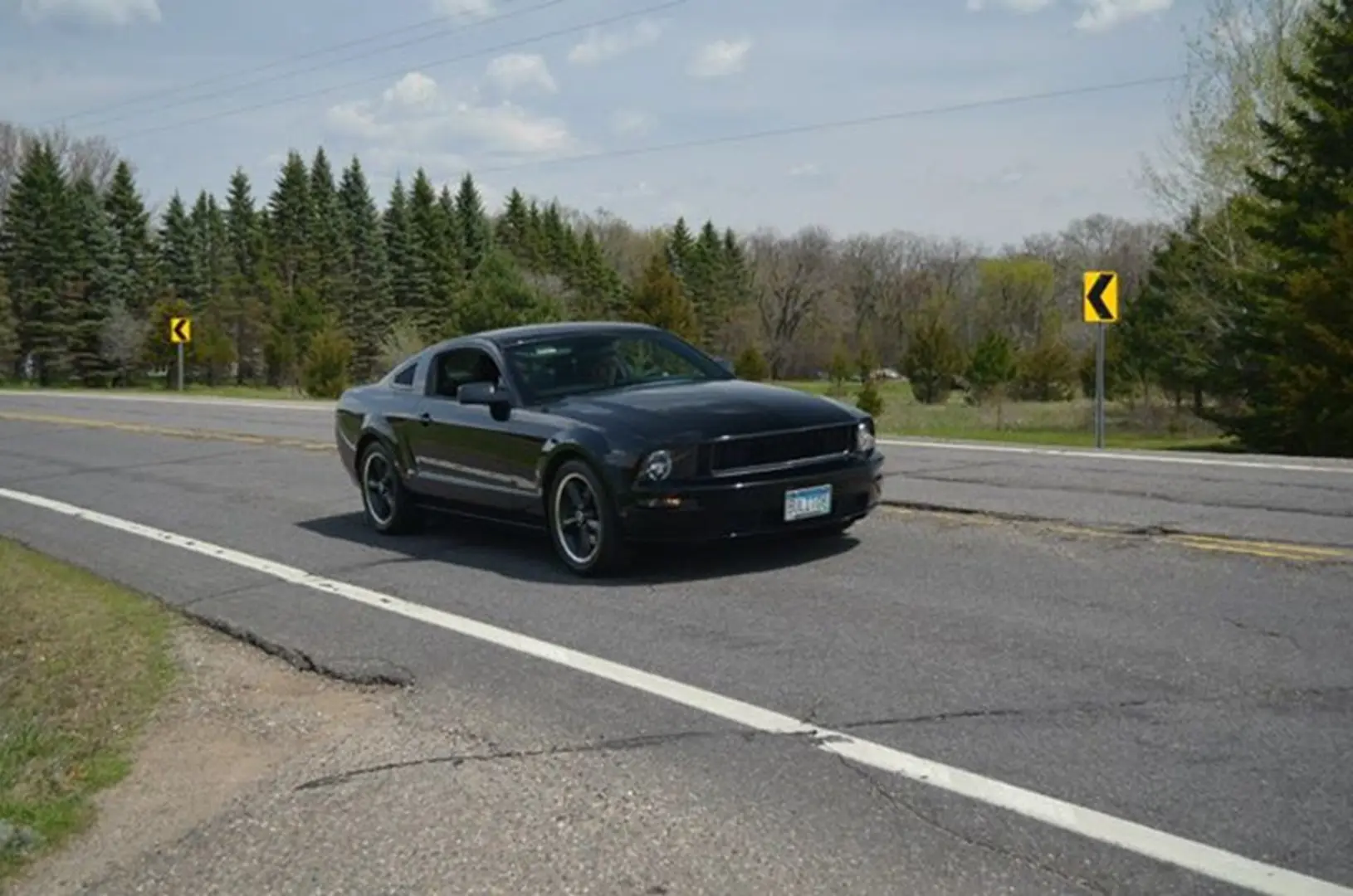 Sports car driving through countryside