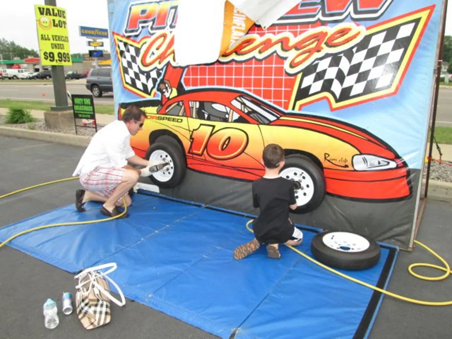 Father and son playing car challenge