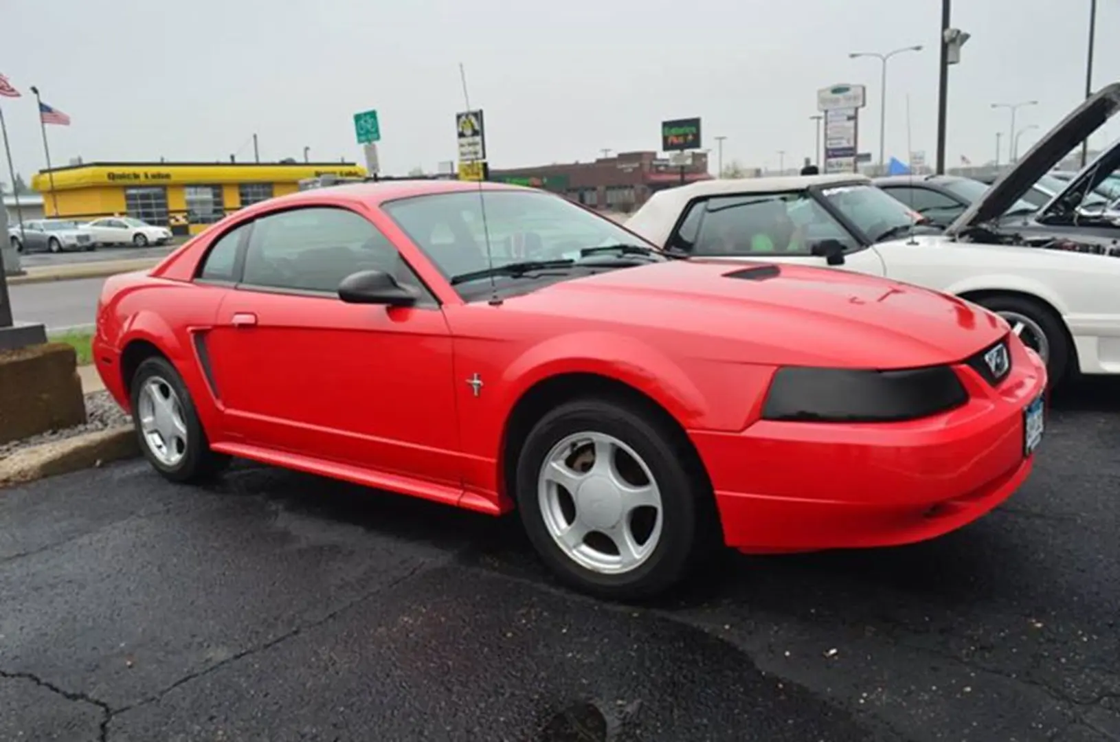 Shiny red car with black accents