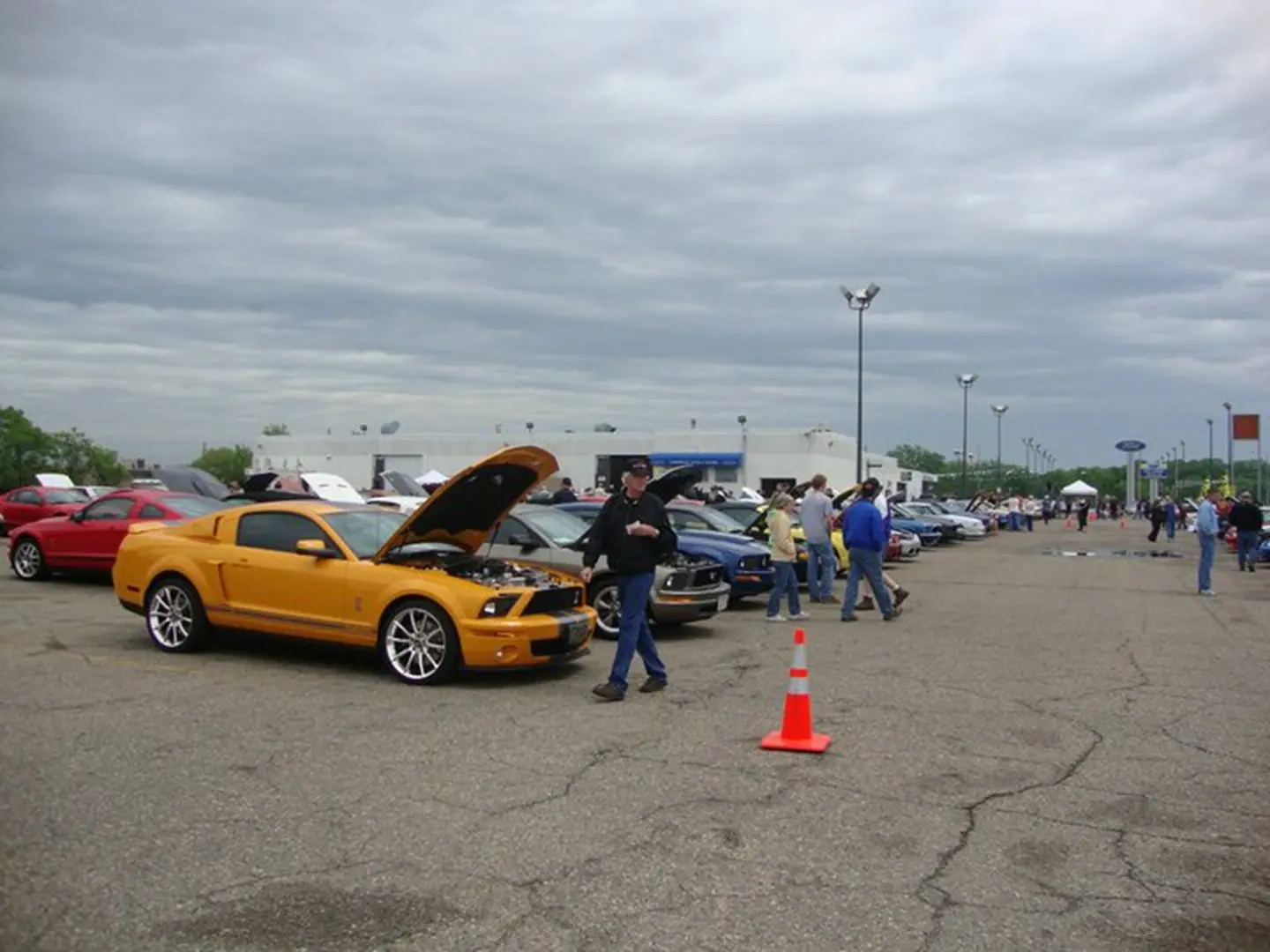 Yellow sports car with open hood