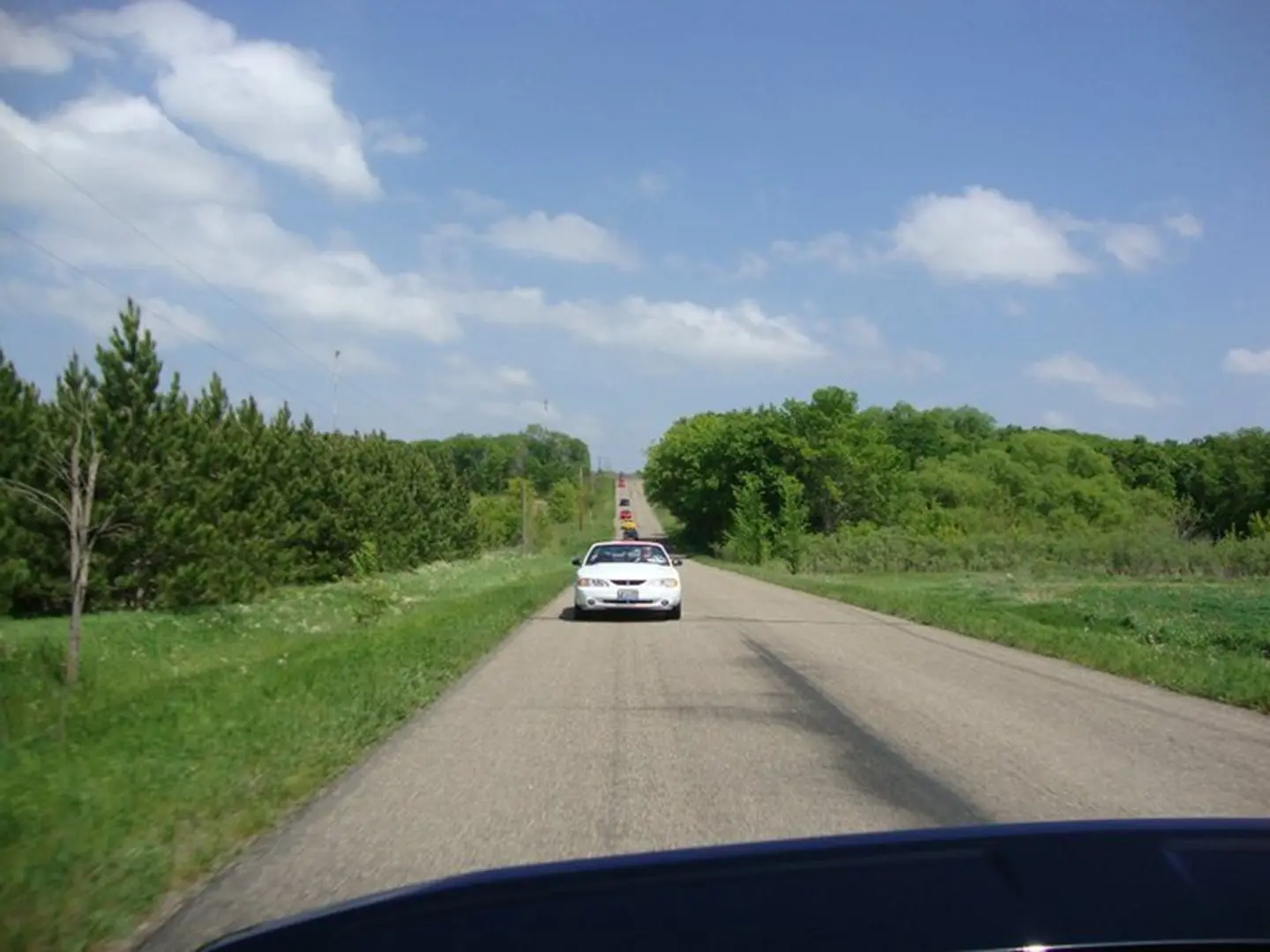 Car driving on rural road