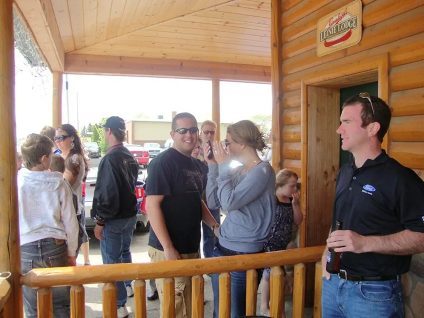 Casual gathering at a wooden lodge