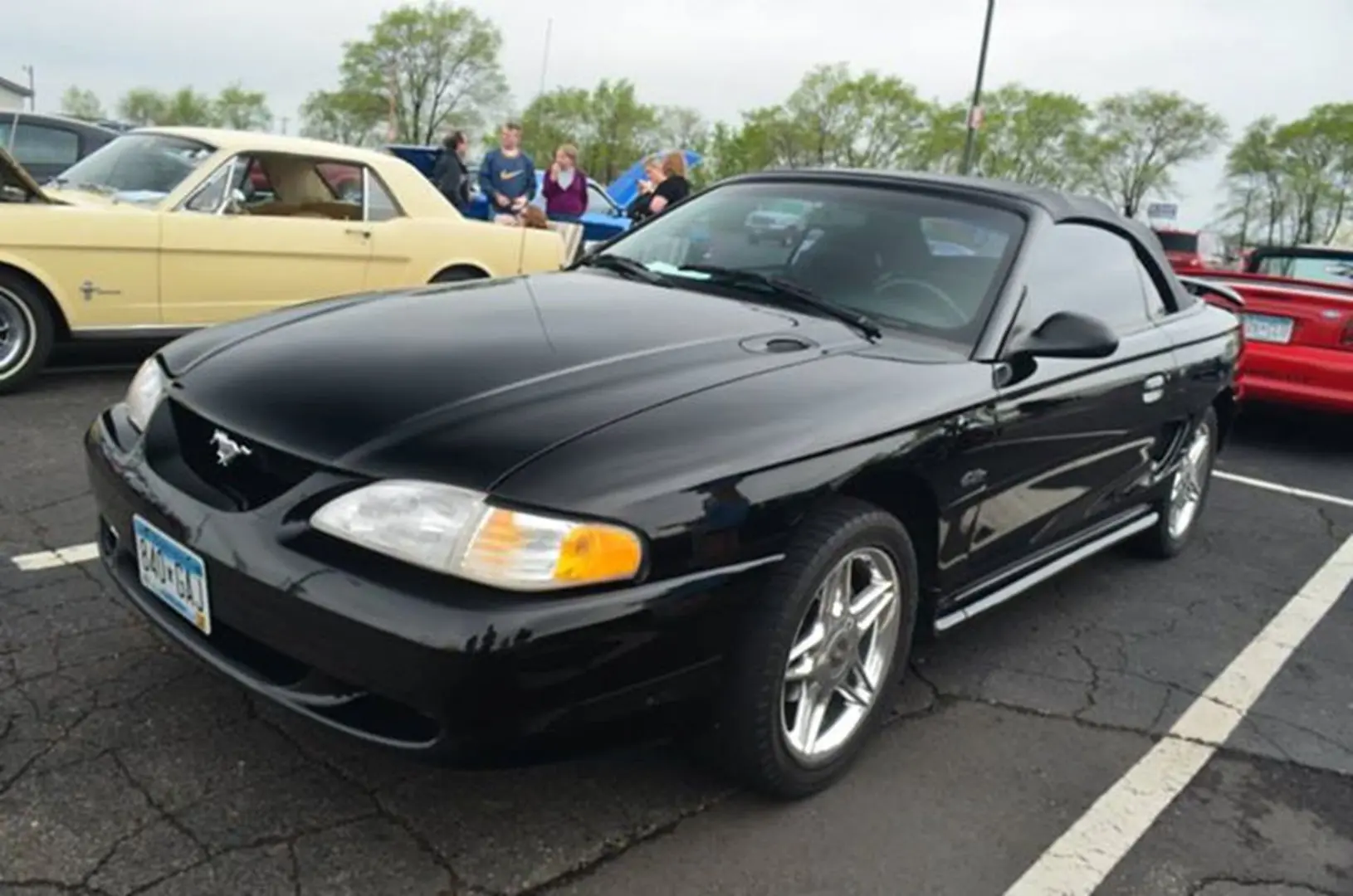 Vintage car show with black convertible