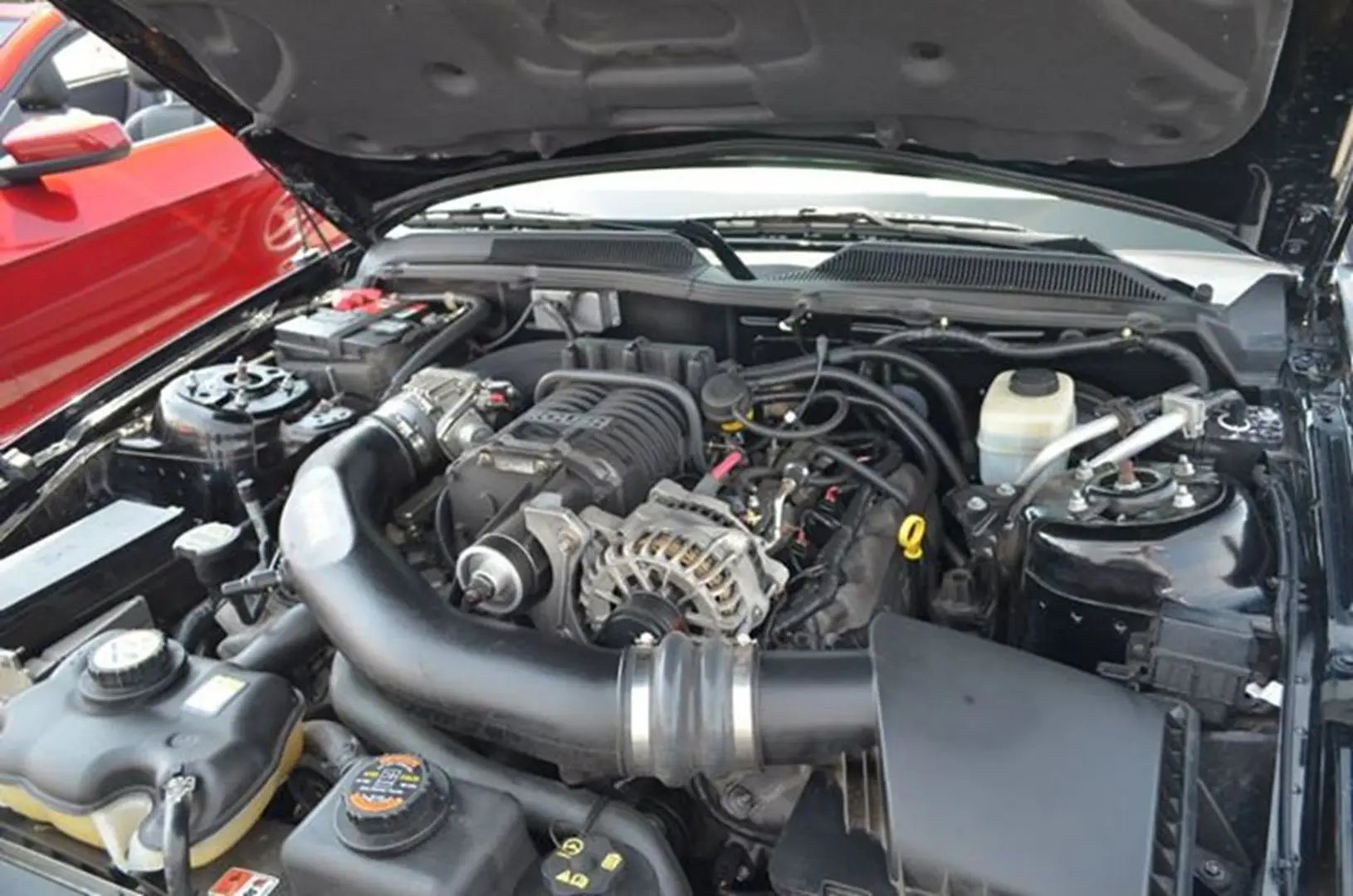 Car engine with open hood