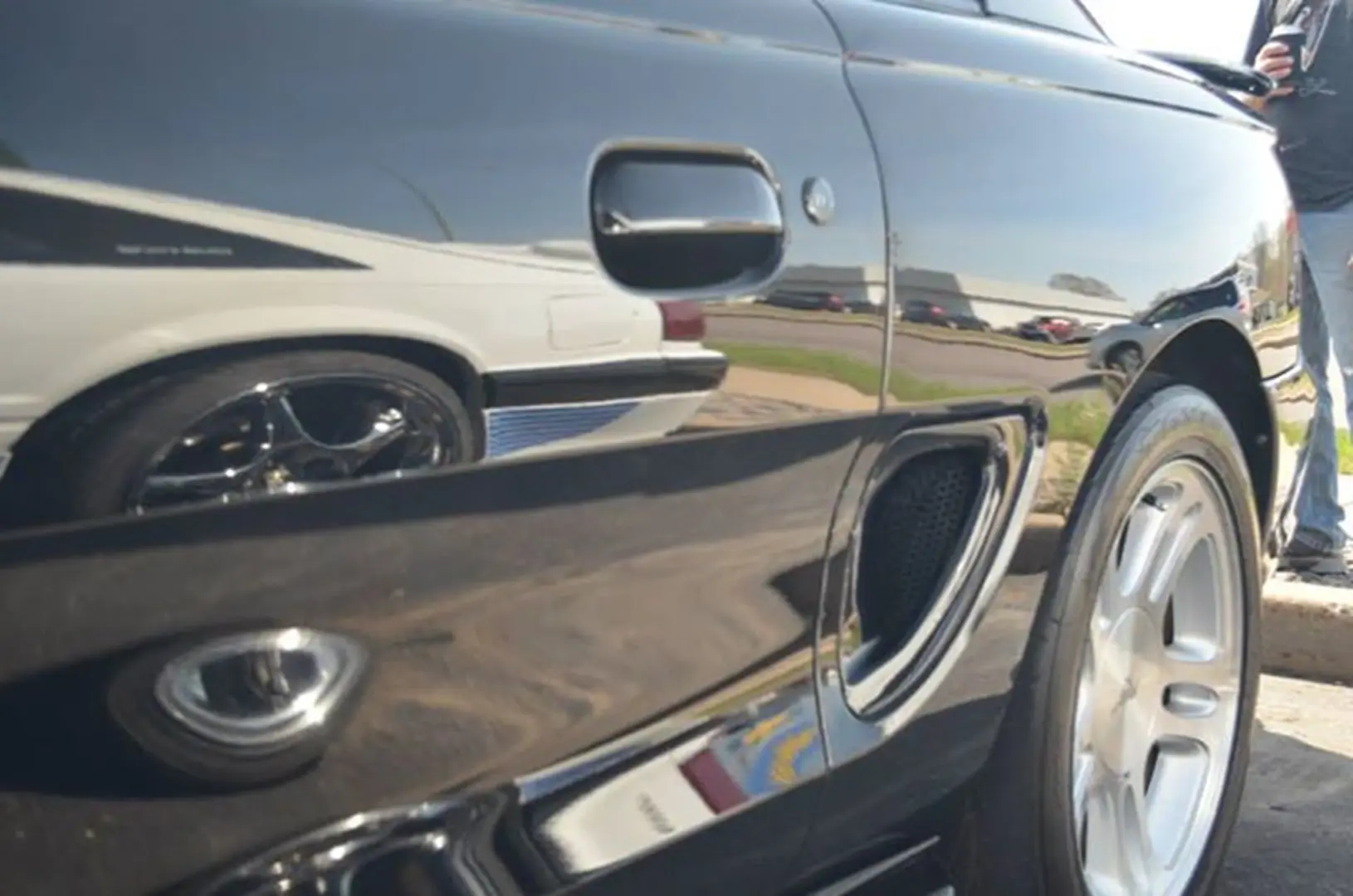 Polished car exterior with reflection