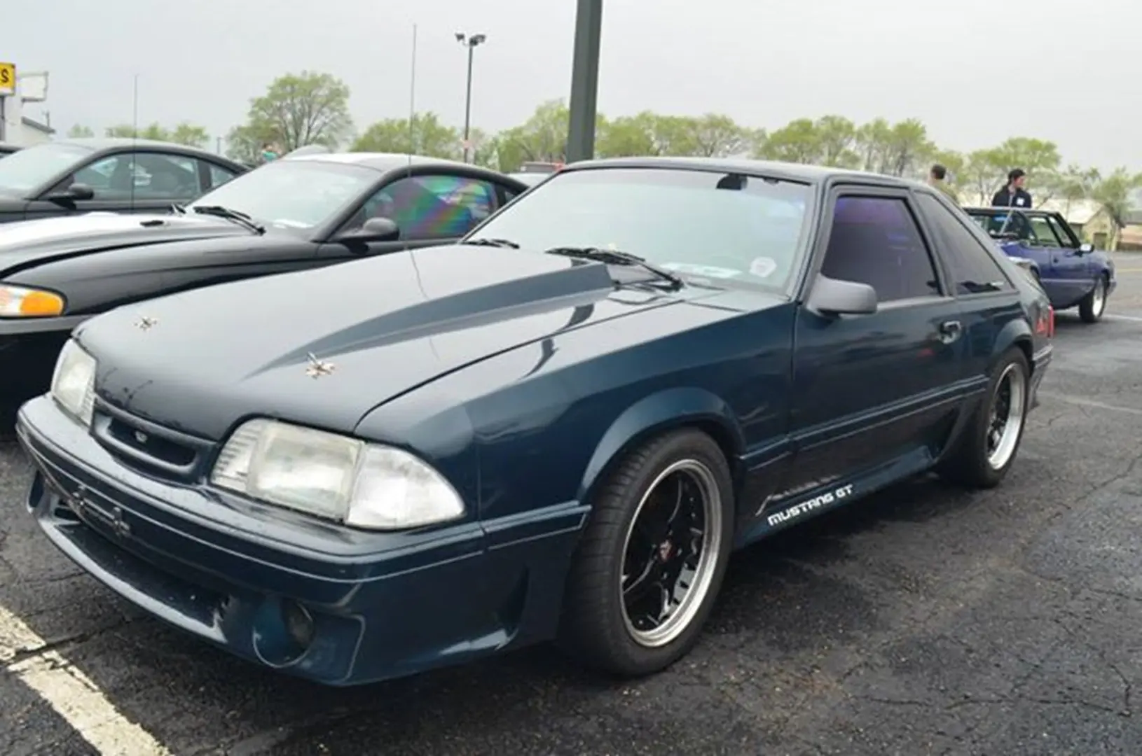 Classic Mustang with custom wheels.